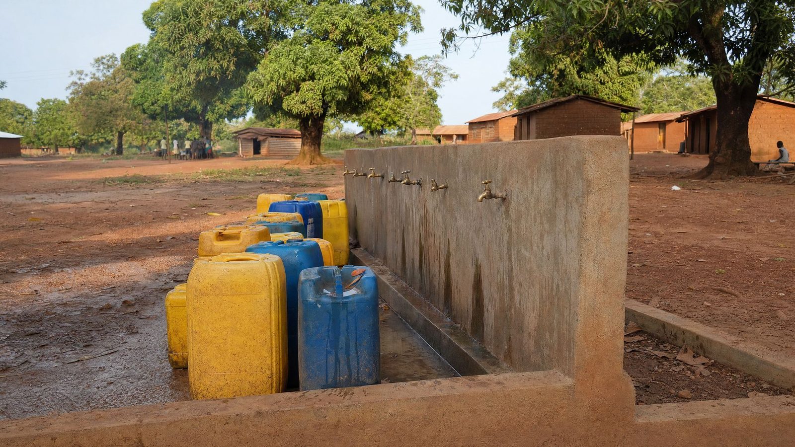 Concrete water channel near a village